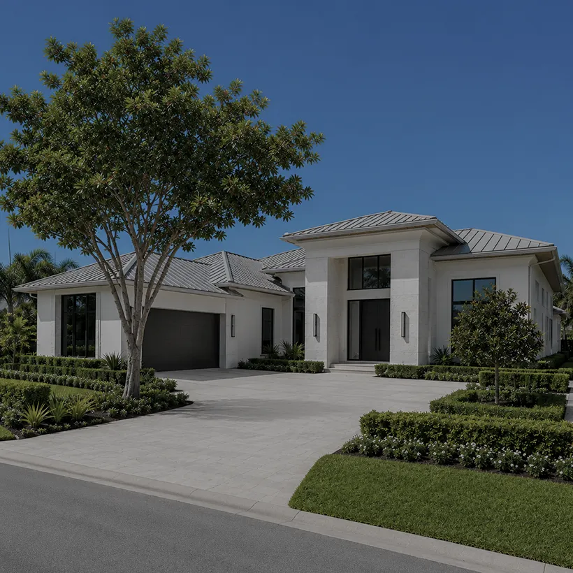 Luxury stucco home with a courtyard garage in Coquina Sands, Naples, Florida