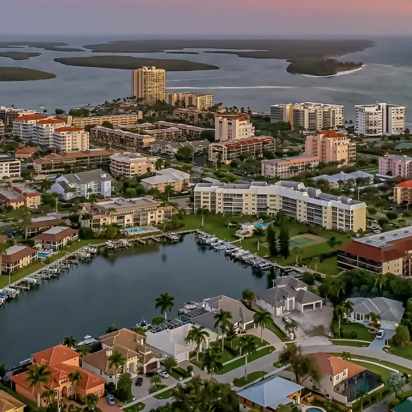 Aerial view of waterfront homes and condominiums on Marco Island, Florida