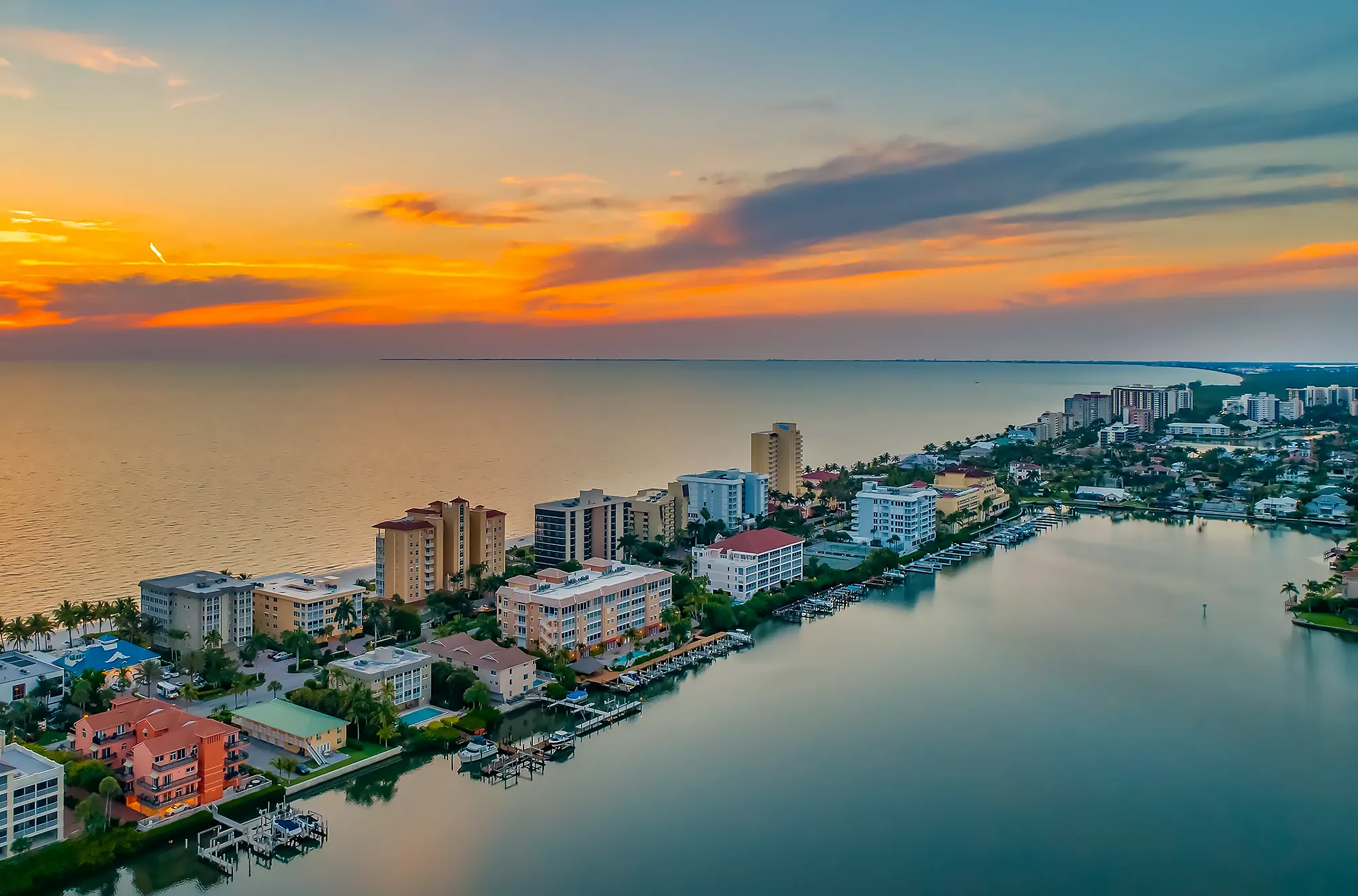 Condominium buildings at Vanderbilt Beach, Naples, Florida, at sunset