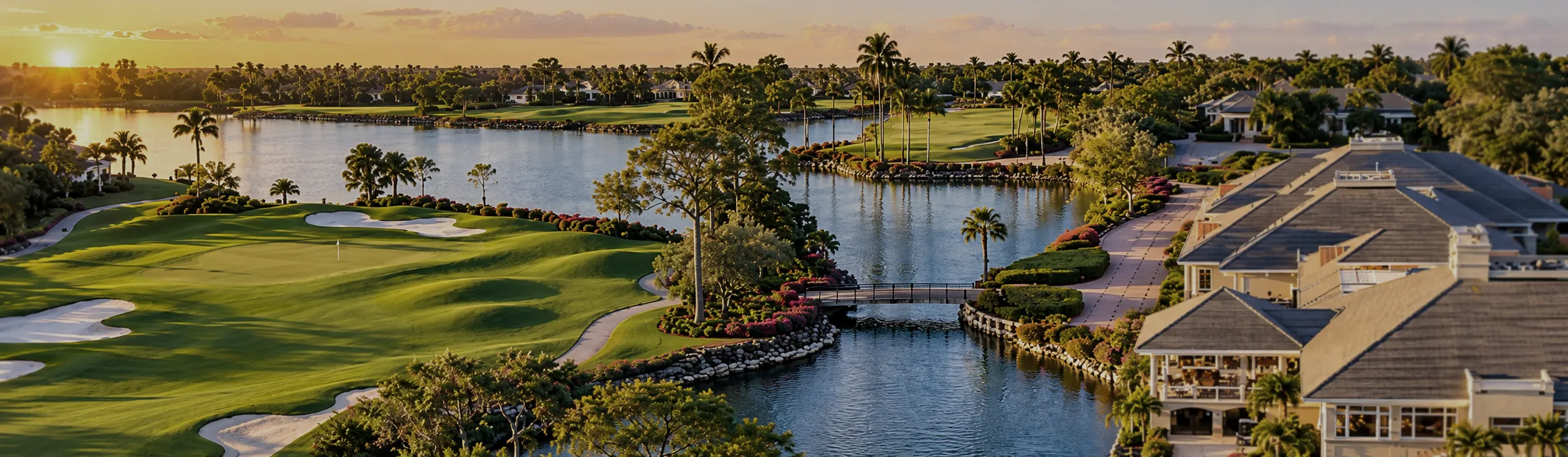 Golf course, lakes and homes at sunset in a Naples, Florida golf community